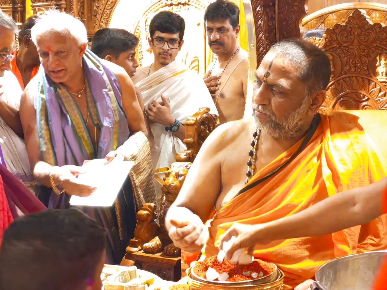 Sri Prasad receiving honours at temple